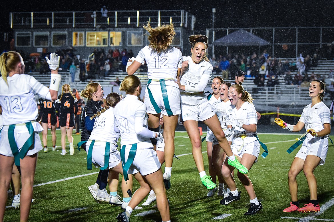 The Glacier Wolfpack celebrate after a 19-0 crosstown win over Flathead at Legends Stadium on Thursday, Sept. 12. (Casey Kreider/Daily Inter Lake)