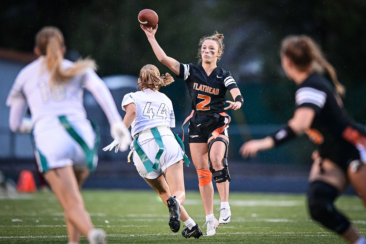 Flathead's Kenlie Roth (2) drops back to pass against Glacier at Legends Stadium on Thursday, Sept. 12. (Casey Kreider/Daily Inter Lake)