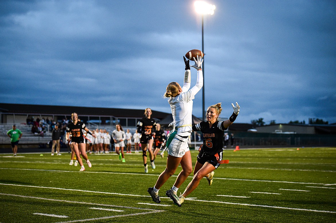 Glacier's Kaydee Walcheck (11) catches a pass against Flathead  at Legends Stadium on Thursday, Sept. 12. (Casey Kreider/Daily Inter Lake)