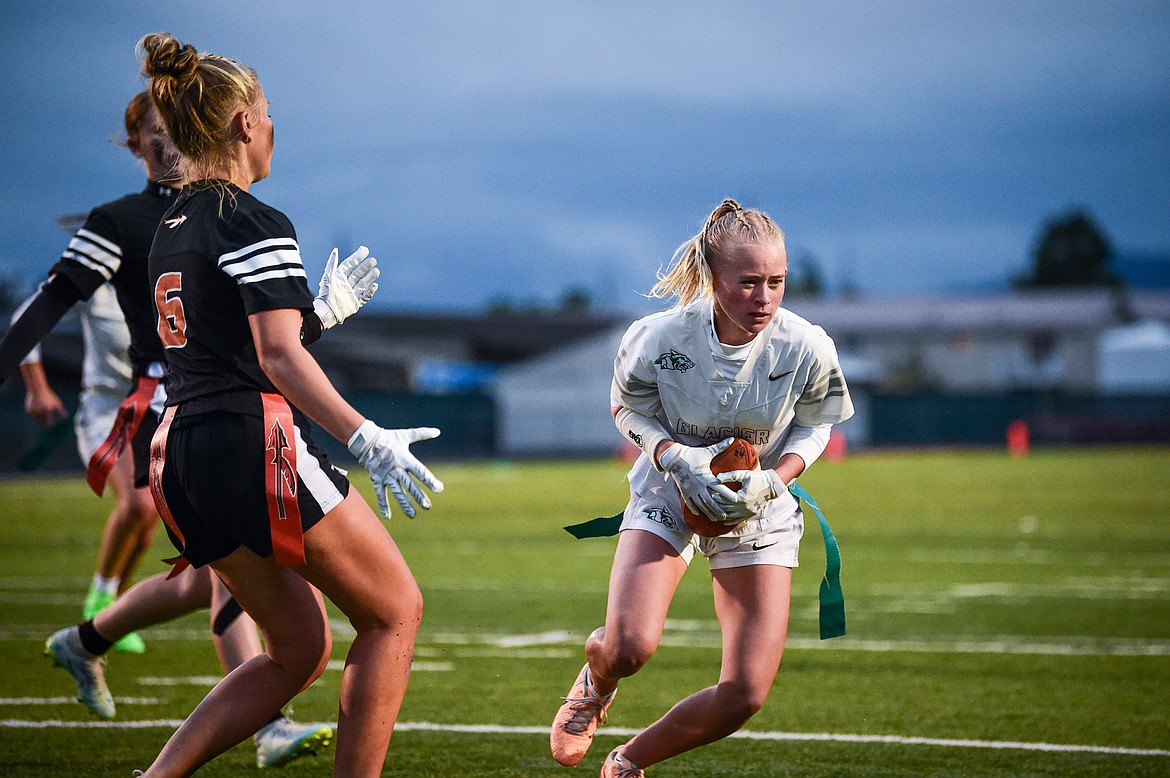 Glacier's Alissa Schuman (13) catches a pass for a two-point conversion against Flathead at Legends Stadium on Thursday, Sept. 12. (Casey Kreider/Daily Inter Lake)