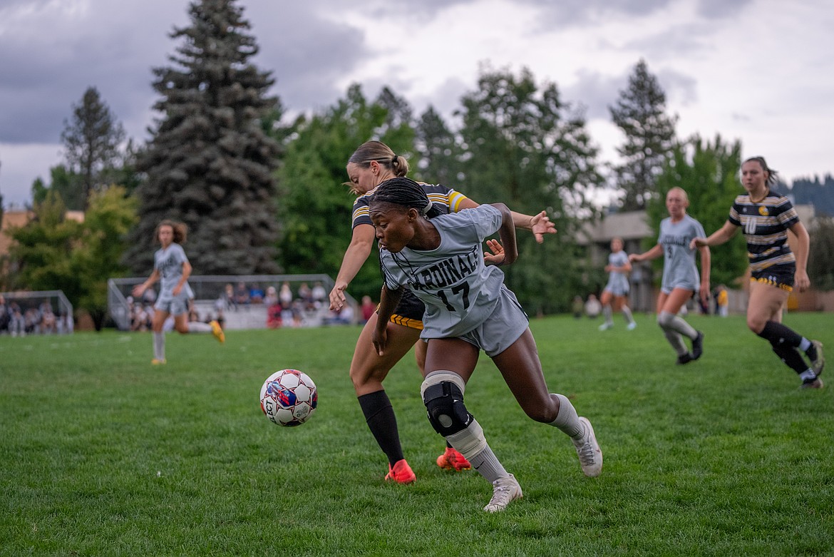 Courtesy photo
North Idaho College freshman forward Alvine Dah-Zossu battles for position with a CSI player during the first half of Thursday's Scenic West Athletic Conference match at Eisenwinter Field.