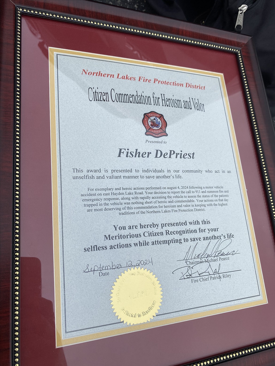 Fisher DePriest was honored Thursday at the Northern Lakes Fire District station in Hayden for his rapid emergency response when a crash occurred where he was fishing.