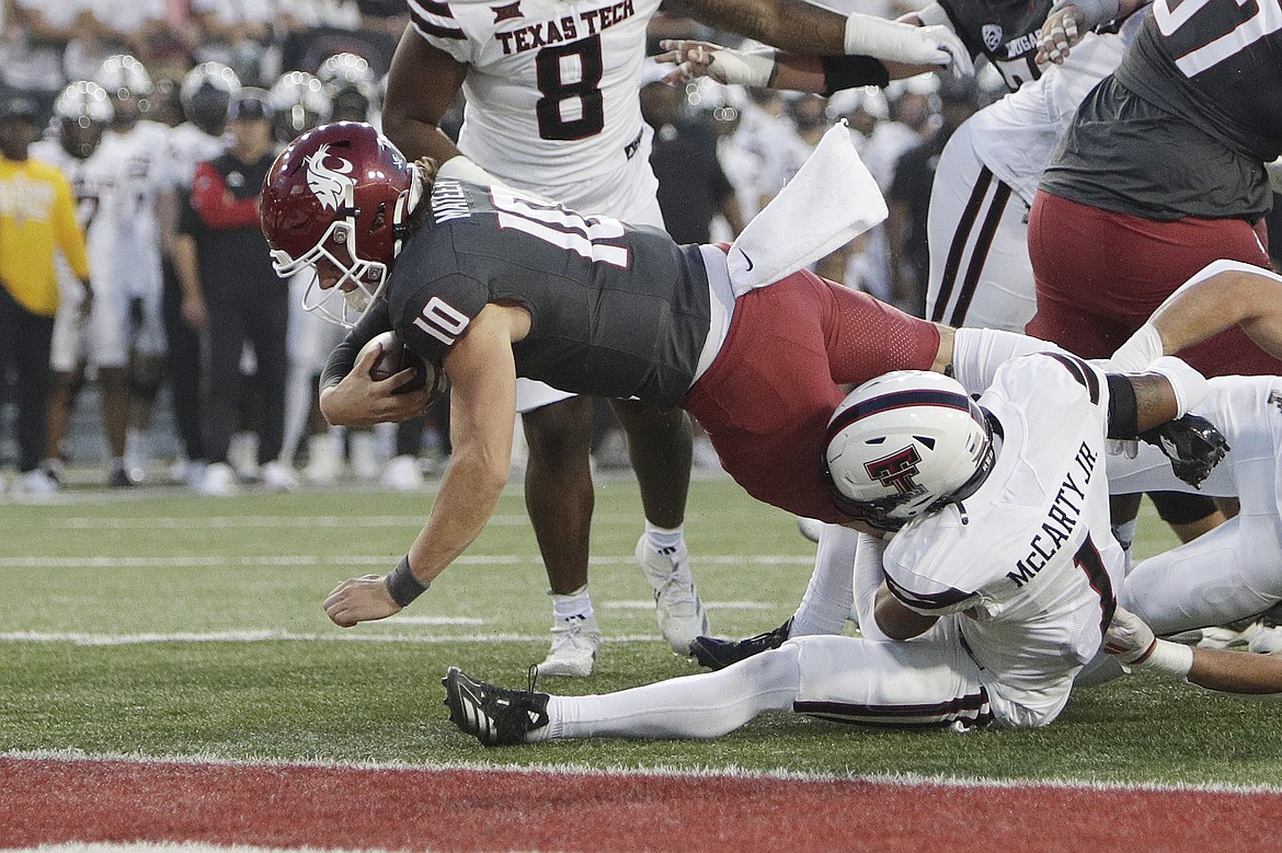 Washington State quarterback John Mateer (10) dives into the end zone during WSU’s 37-16 win over Texas Tech last week.