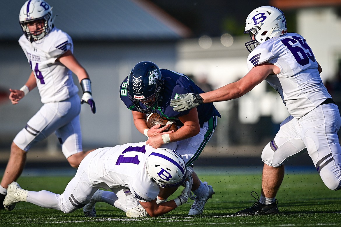 Glacier defensive lineman Wayne Cox (52) intercepts a pass in the first quarter against Butte at Legends Stadium on Friday, Sept. 13. (Casey Kreider/Daily Inter Lake)