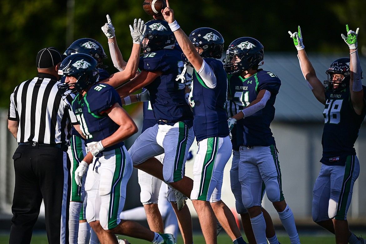 Glacier defensive lineman Wayne Cox (52) celebrates with teammates after an interception in the first quarter against Butte at Legends Stadium on Friday, Sept. 13. (Casey Kreider/Daily Inter Lake)