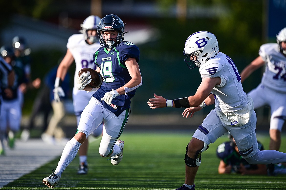 Glacier punt returner Easton Kauffman (19) returns a punt into Butte territory in the first half at Legends Stadium on Friday, Sept. 13. (Casey Kreider/Daily Inter Lake)