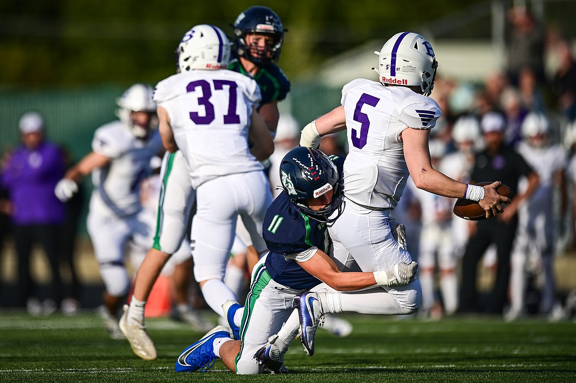 Glacier linebacker Asher Knopik (11) sacks Butte quarterback Colton Shea (5) in the first quarter at Legends Stadium on Friday, Sept. 13. (Casey Kreider/Daily Inter Lake)