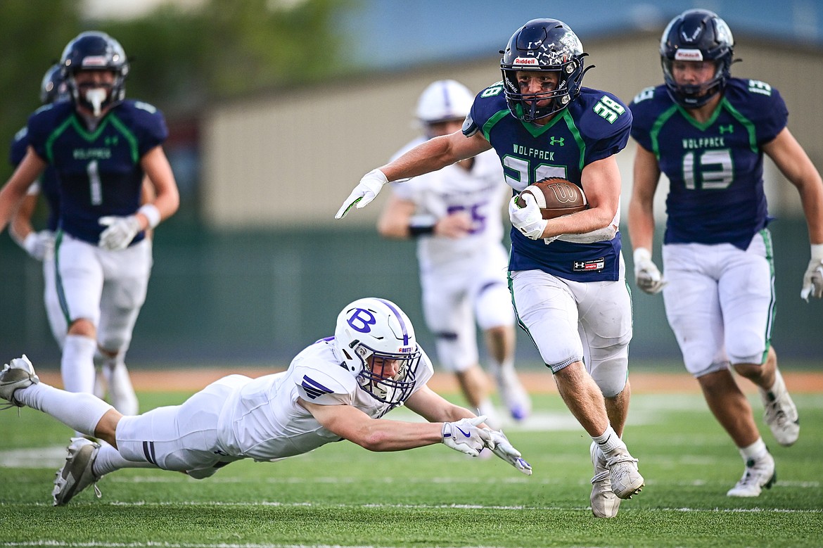 Glacier kick returner Carson Baker (38) returns a kickoff in the third quarter against Butte at Legends Stadium on Friday, Sept. 13. (Casey Kreider/Daily Inter Lake)