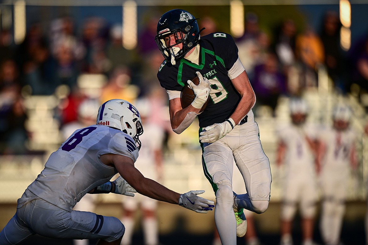 Glacier wide receiver Cooper Pelc (8) picks up yardage after a reception in the second quarter against Butte at Legends Stadium on Friday, Sept. 13. (Casey Kreider/Daily Inter Lake)