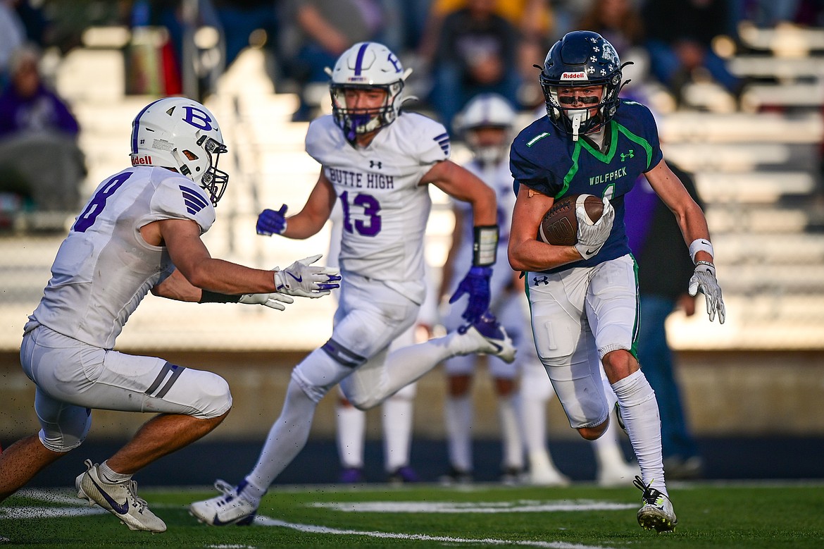 Glacier wide receiver Bridger Smith (1) picks up yardage after a reception in the second quarter against Butte at Legends Stadium on Friday, Sept. 13. (Casey Kreider/Daily Inter Lake)