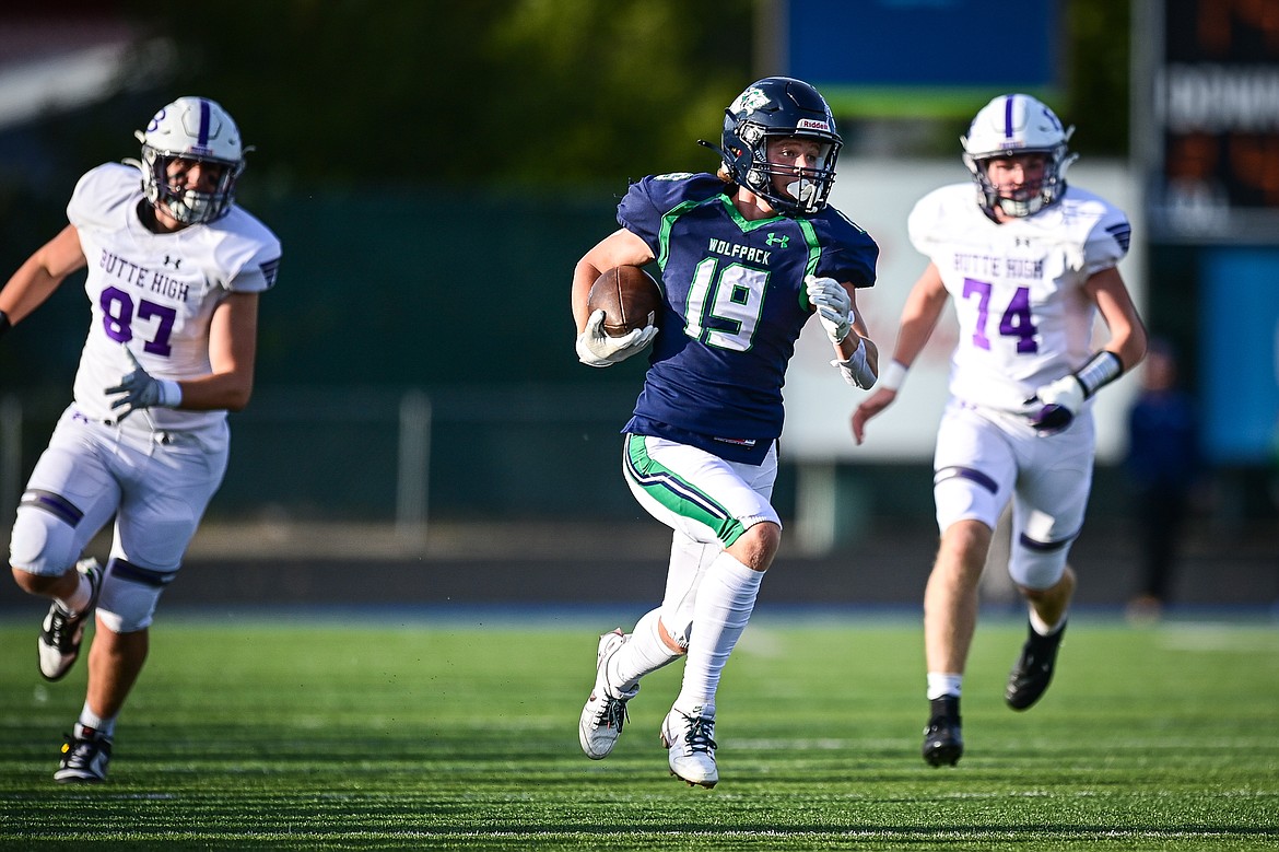 Glacier punt returner Easton Kauffman (19) returns a punt into Butte territory in the first half at Legends Stadium on Friday, Sept. 13. (Casey Kreider/Daily Inter Lake)