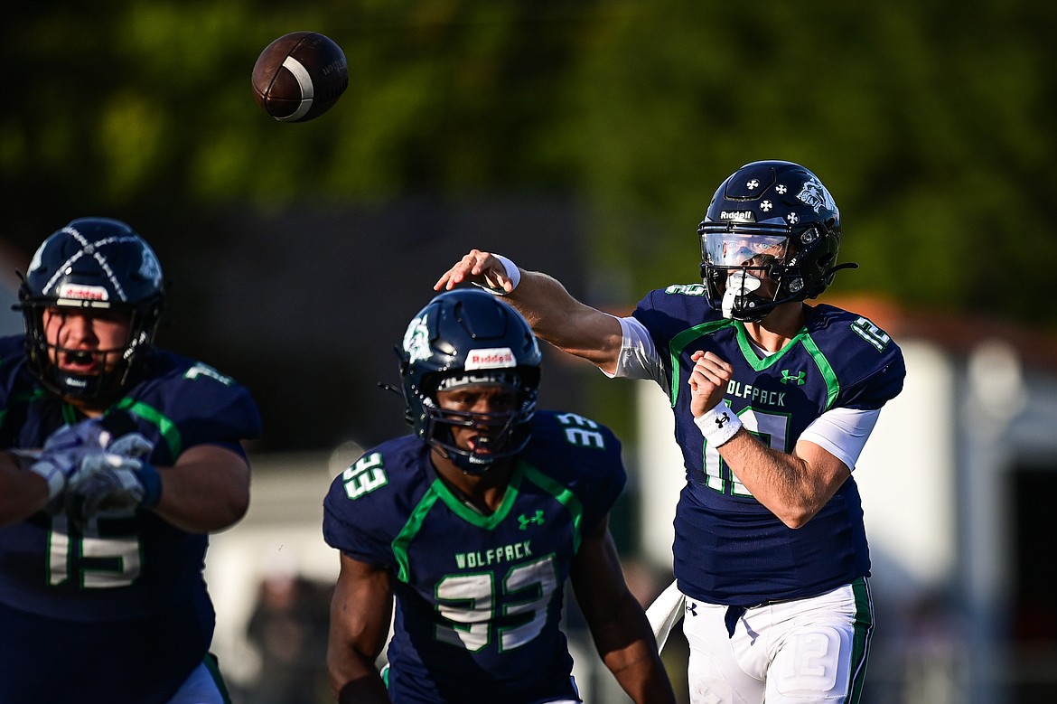 Glacier quarterback Jackson Presley (12) drops back to pass in the first quarter against Butte at Legends Stadium on Friday, Sept. 13. (Casey Kreider/Daily Inter Lake)