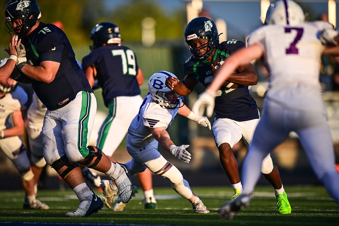 Glacier running back Kobe Dorcheus (33) runs for a touchdown in the third quarter against Butte at Legends Stadium on Friday, Sept. 13. (Casey Kreider/Daily Inter Lake)