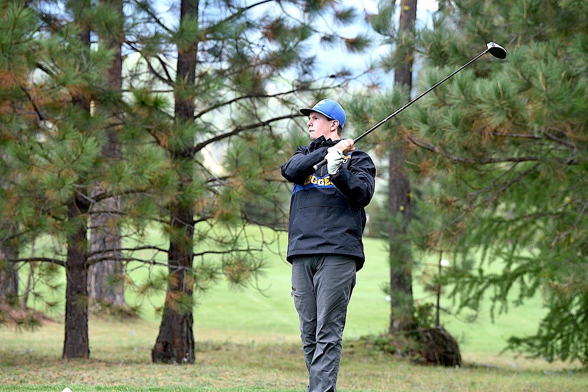 Libby's Noah Brothers watches his tee shot on No. 5 Friday, Sept. 13, 2024, at Cabinet View Golf Course. (Scott Shindledecker/The Western News)