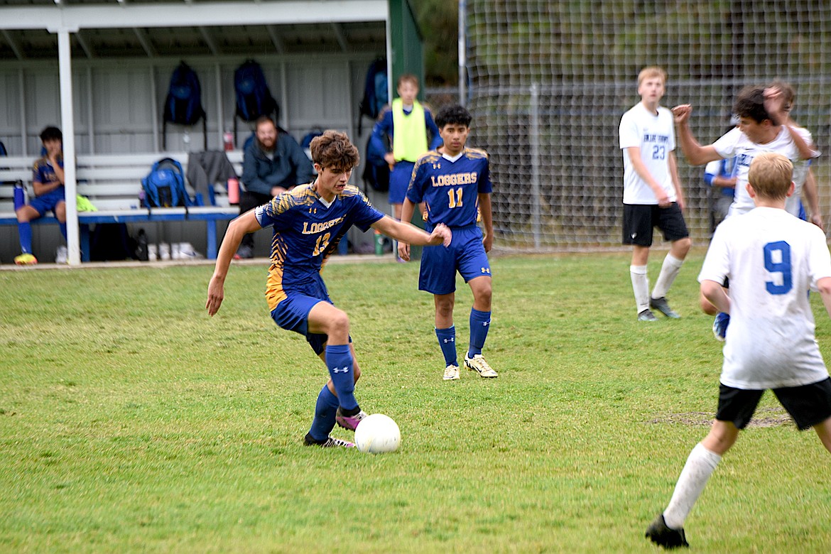 Libby's Dylan Warner heads upfield Thursday, Sept. 12, 2024, against Thompson Falls at J. Neils Memorial Field. (Scott Shindledecker/The Western News)