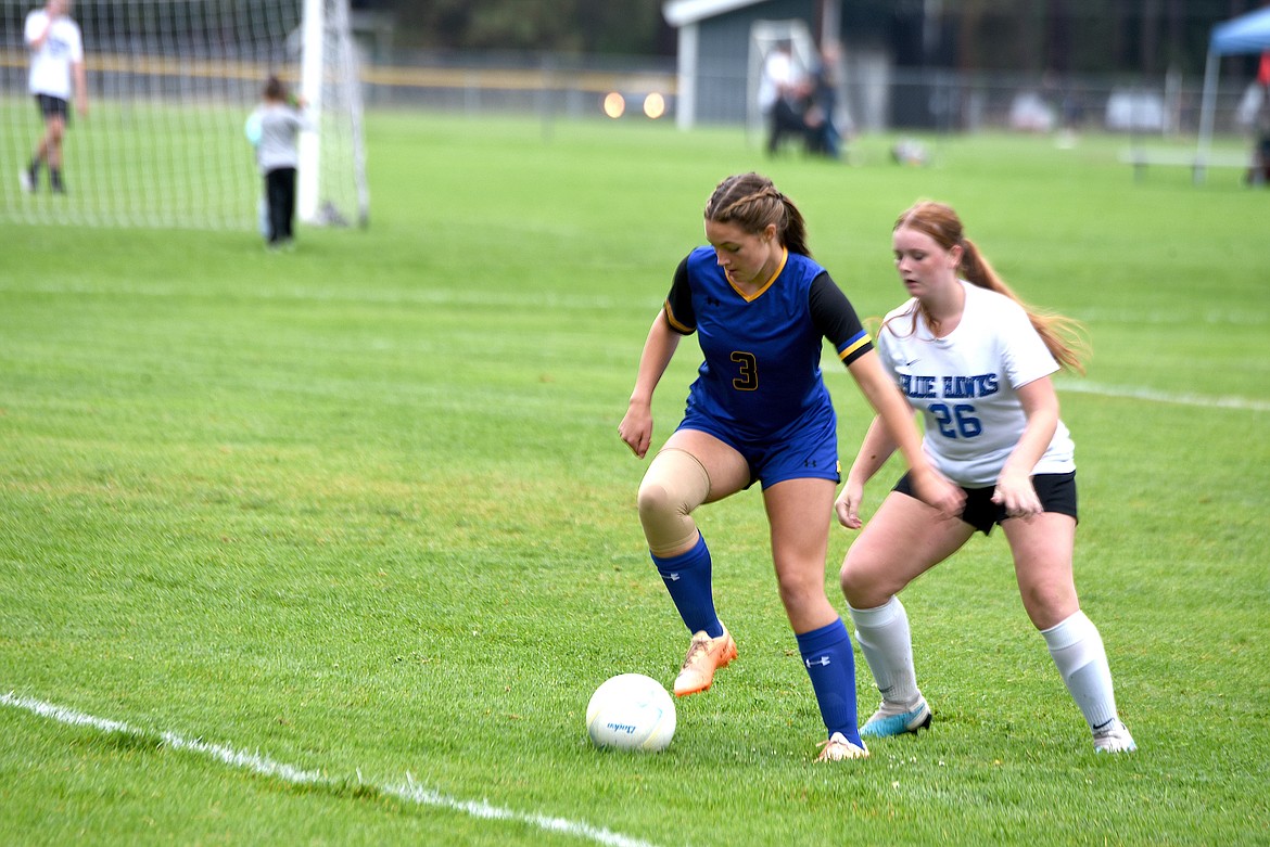 Libby's Zoe Warner outmaneuvers a Thompson Falls player Thursday, Sept. 12, 2024, at J. Neils Memorial Field. (Scott Shindledecker/The Western News)