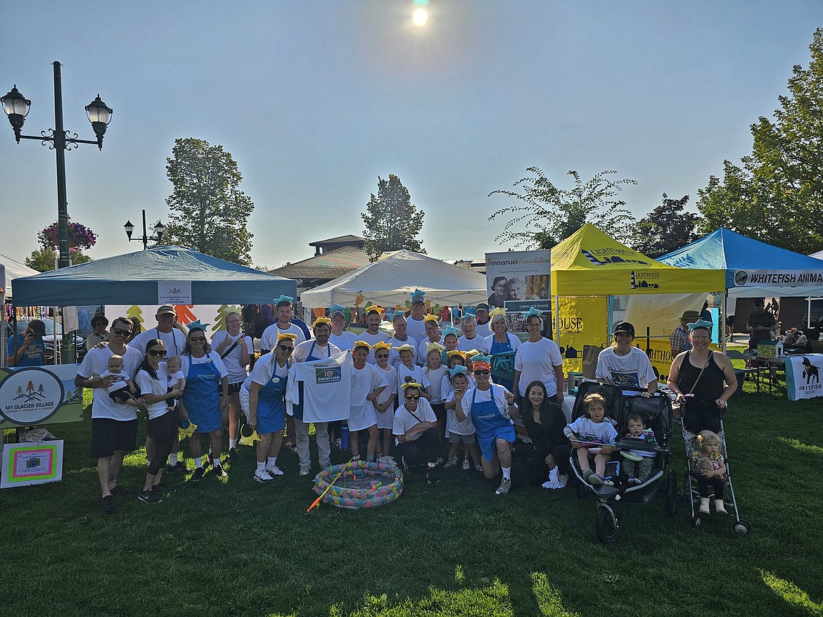 Supporters of the Immanuel Foundation gathers for a group photo at the Great Fish Community Challenge Fun Run. The Immanuel Foundation was founded in 2018 to raise funds to serve the needs of seniors through Immanuel Lutheran Communities in Kalispell. (Kelsey Evans/Whitefish Pilot)