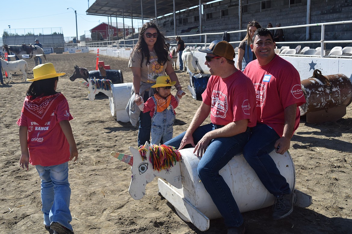 Participants at the Rascal Rodeo rode tin horses and cattle. There were tins that rocked and ones that rolled side to side.