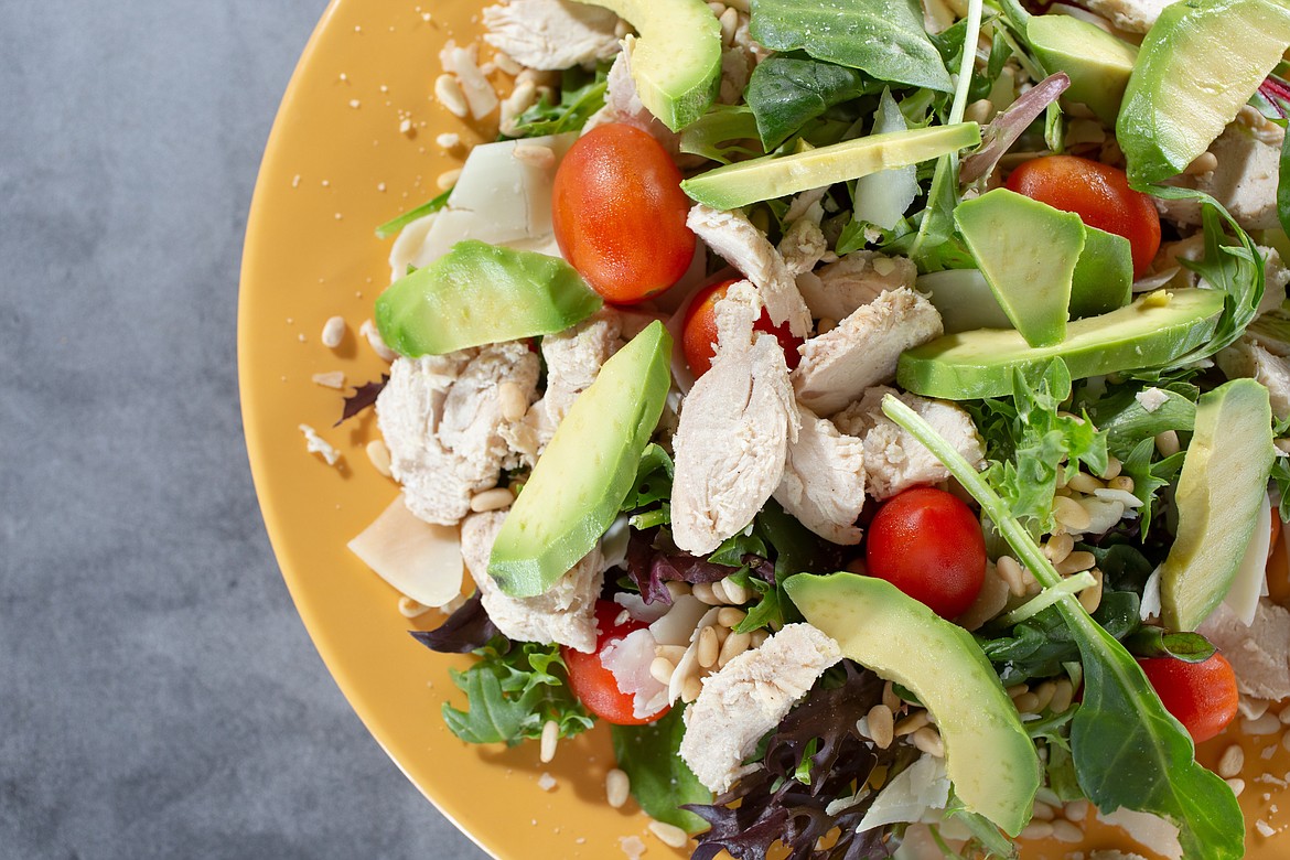 A California salad makes for a delicious meal, one of many versatile ways chicken can be used.