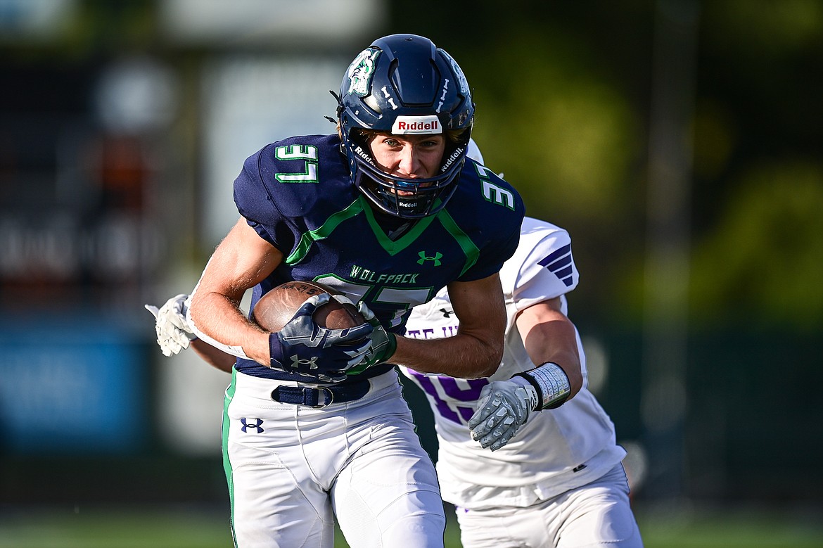 Glacier wide receiver Ethan Anderson (37) heads upfield for a touchdown after a reception in the first quarter against Butte at Legends Stadium on Friday, Sept. 13. (Casey Kreider/Daily Inter Lake)