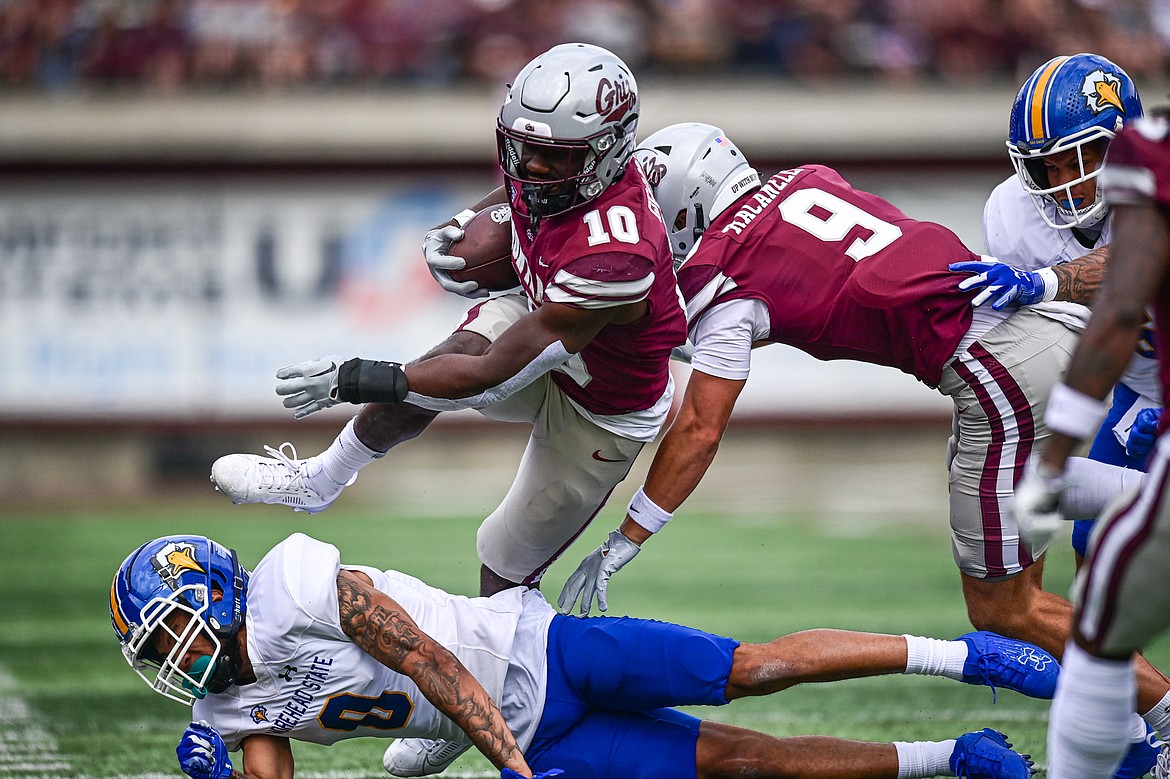 Grizzlies running back Eli Gillman (10) picks up yardage on a run in the first quarter against Morehead State on Saturday, Sept. 14. (Casey Kreider/Daily Inter Lake)