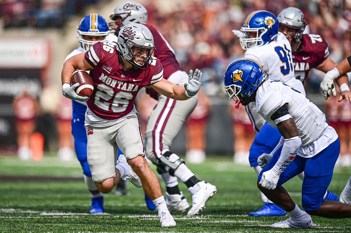 Grizzlies running back Nick Ostmo (26) picks up yardage on a run in the second quarter against Morehead State on Saturday, Sept. 14. (Casey Kreider/Daily Inter Lake)