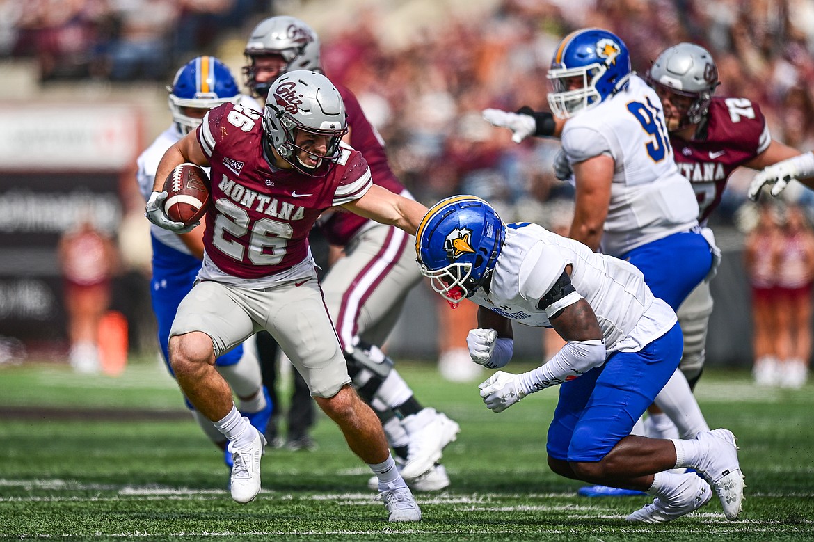 Grizzlies running back Nick Ostmo (26) picks up yardage on a run in the second quarter against Morehead State on Saturday, Sept. 14. (Casey Kreider/Daily Inter Lake)