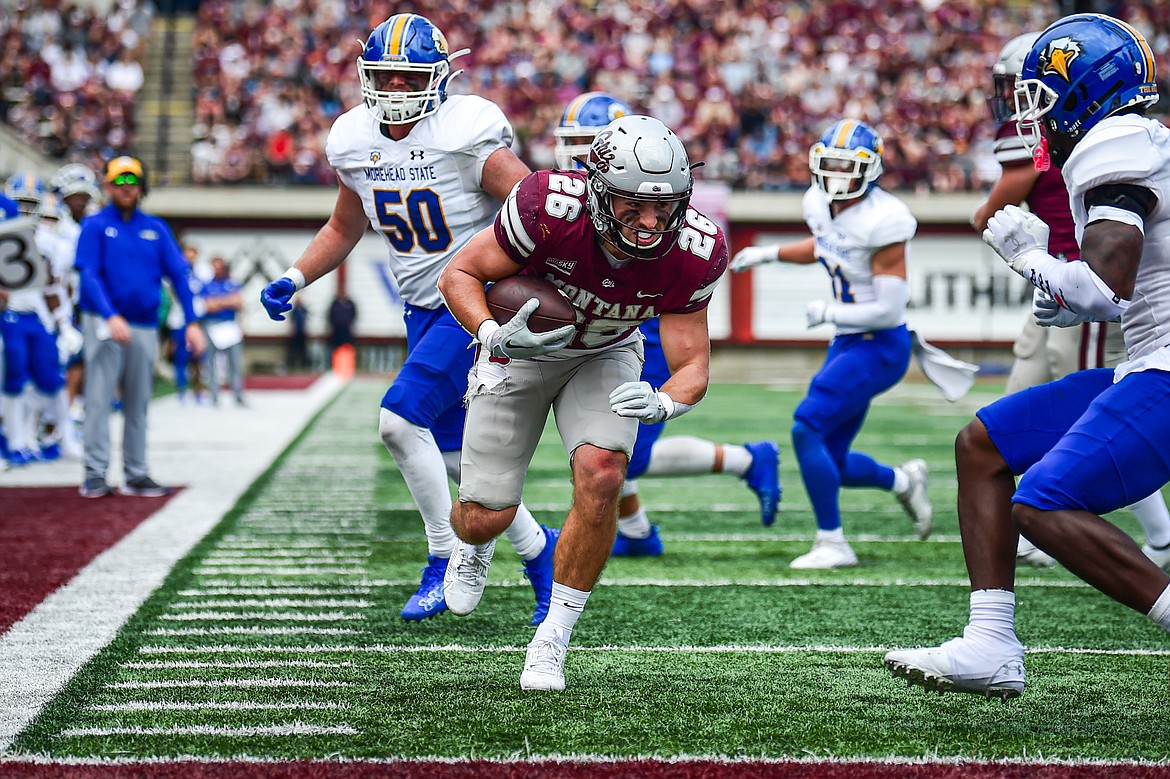 Grizzlies running back Nick Ostmo (26) scores a touchdown on a 10-yard run in the second quarter against Morehead State on Saturday, Sept. 14. (Casey Kreider/Daily Inter Lake)