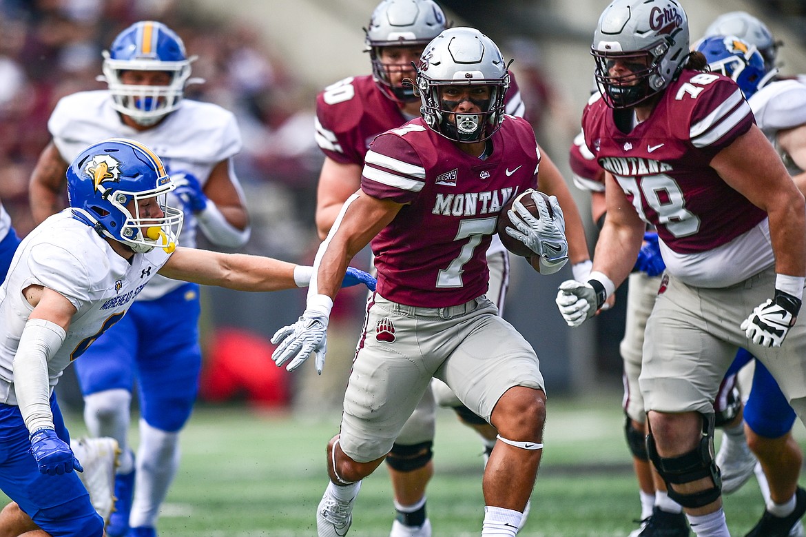 Grizzlies running back Malae Fonoti (7) picks up yardage on a run in the third quarter against Morehead State on Saturday, Sept. 14. (Casey Kreider/Daily Inter Lake)