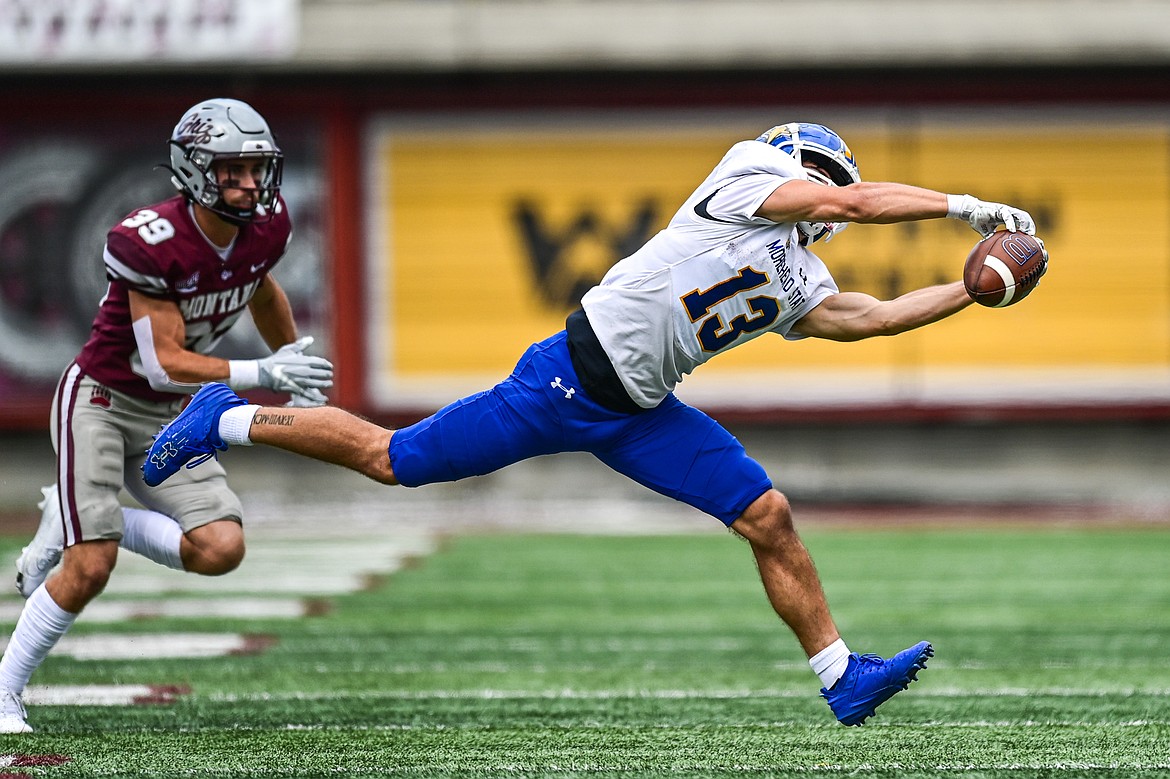 Morehead State wide receiver Ryan Upp (13) holds on to a reception in the third quarter against Montana on Saturday, Sept. 14. (Casey Kreider/Daily Inter Lake)