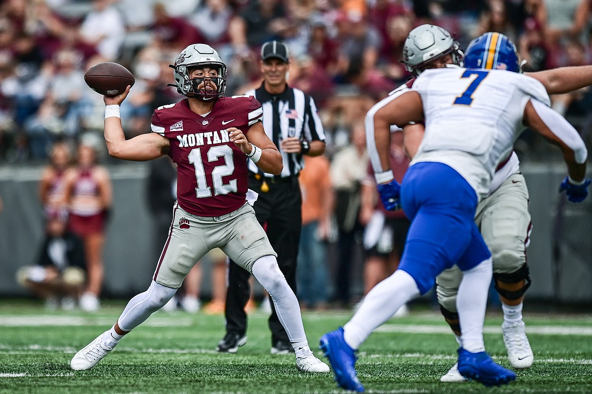 Grizzlies quarterback Logan Fife (12) throws a pass in the second quarter against Morehead State on Saturday, Sept. 14. (Casey Kreider/Daily Inter Lake)