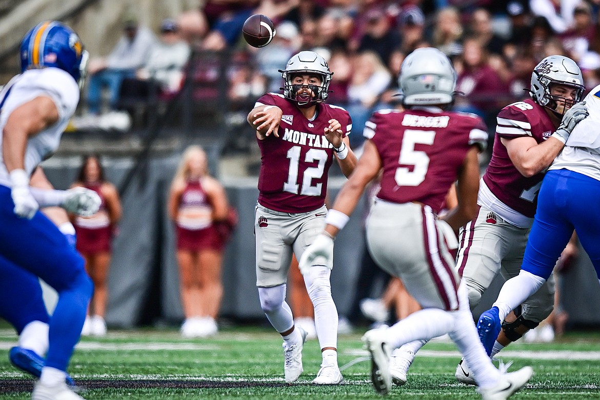 Grizzlies quarterback Logan Fife (12) throws a pass in the second quarter against Morehead State on Saturday, Sept. 14. (Casey Kreider/Daily Inter Lake)