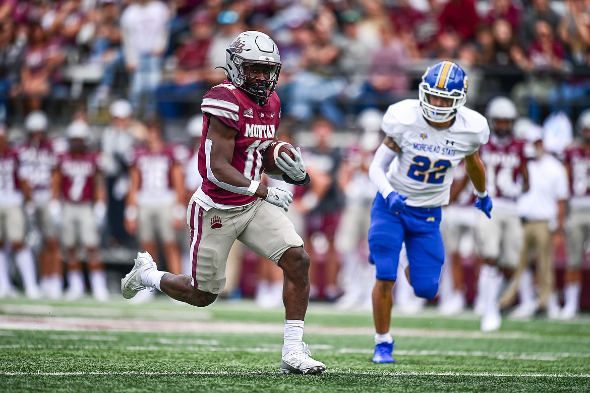 Grizzlies running back Eli Gillman (10) runs for a 22-yard touchdown in the second quarter against Morehead State on Saturday, Sept. 14. (Casey Kreider/Daily Inter Lake)