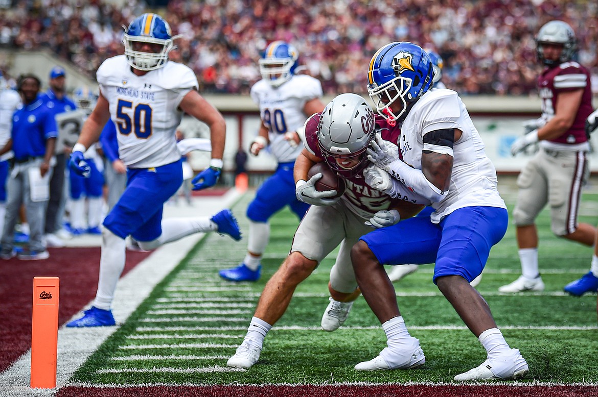 Grizzlies running back Nick Ostmo (26) scores a touchdown on a 10-yard run in the second quarter against Morehead State on Saturday, Sept. 14. (Casey Kreider/Daily Inter Lake)