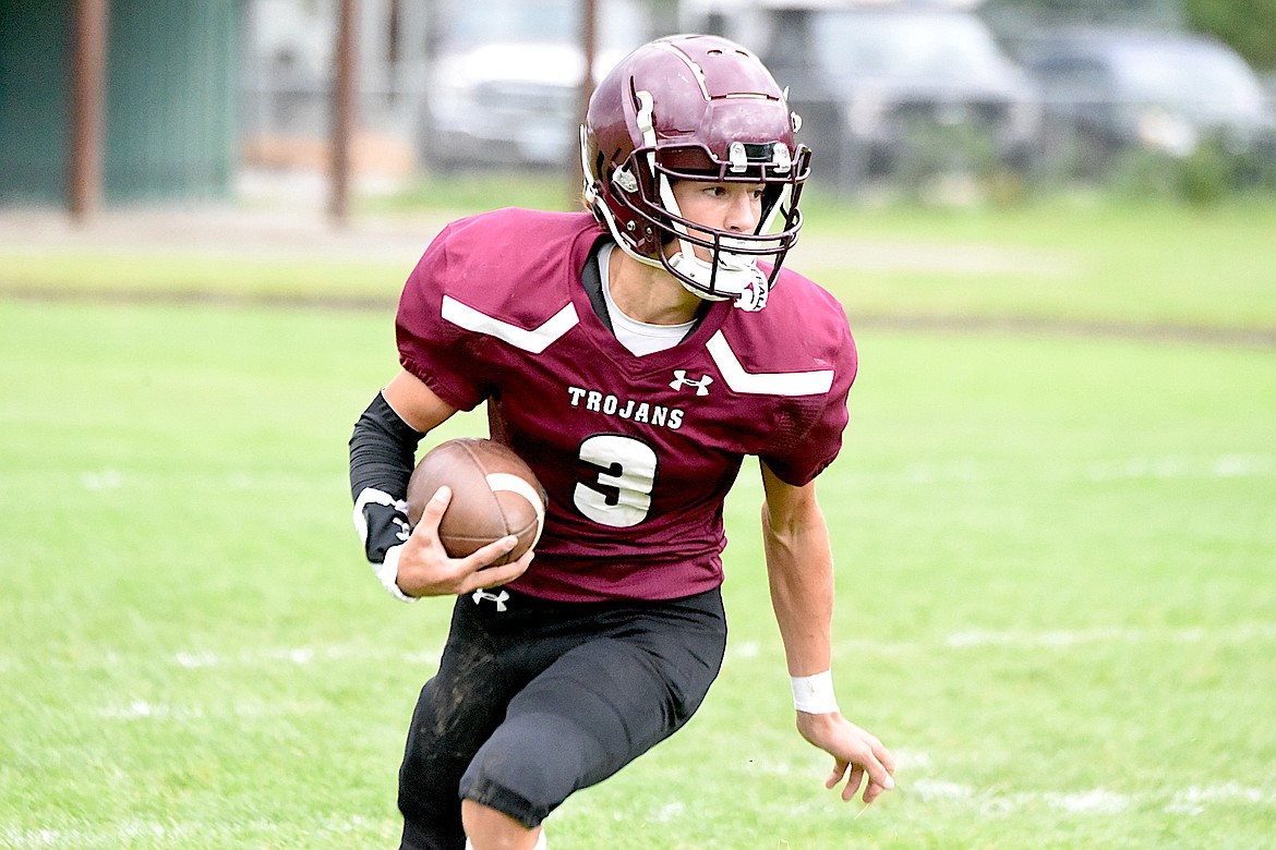 Troy junior Carson Orr looks for room to run Saturday, Sept. 14, 2024, against Valley Christian. (Scott Shindledecker/The Western News)