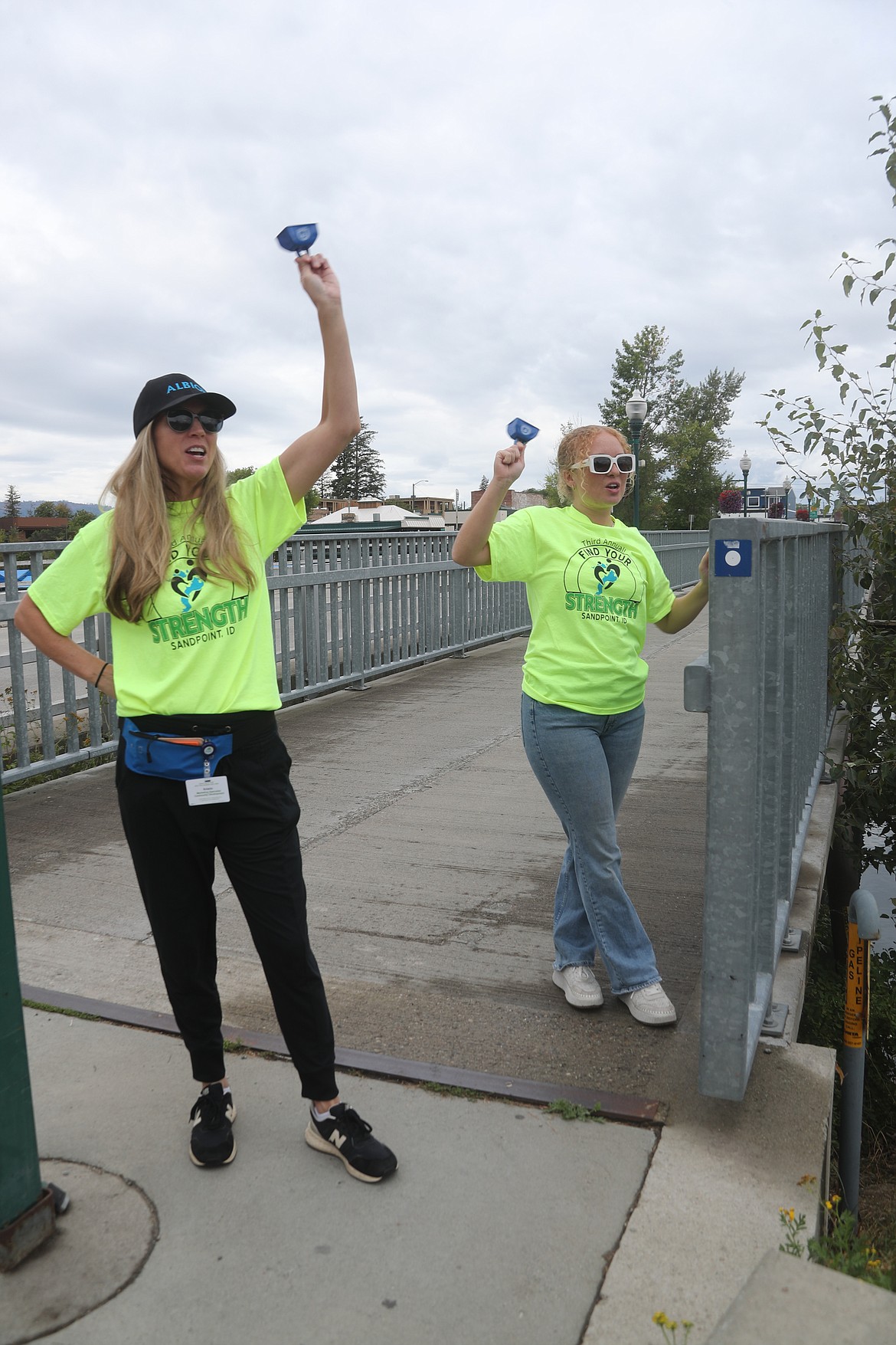 Find Your Strength Fun Run volunteers cheer on runners.