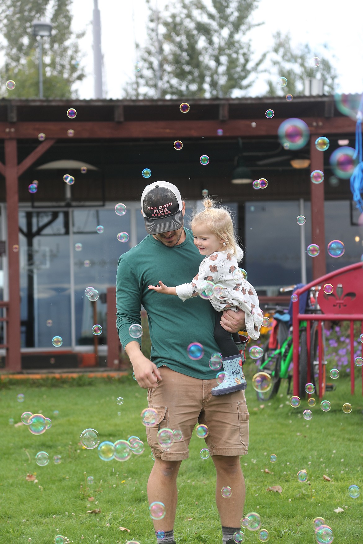 Jake and Juliet Franklin are surrounded by the bubbles at the Find Your Strength Family Fun Run afterparty.