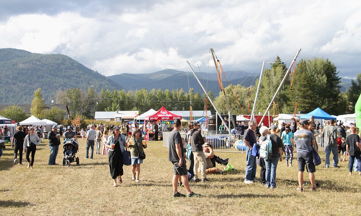 Attendees enjoy a brief window of sunshine during Saturday's event.