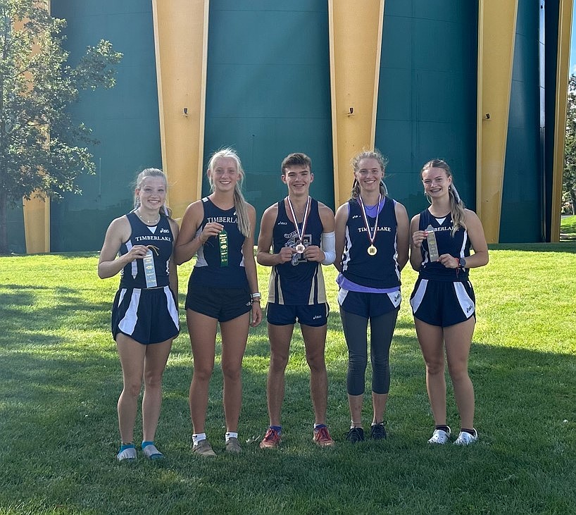 Courtesy photo
Members of the Timberlake High cross country team earned medals for finishing in the top 10 of their races at the Highlander Invitational at Shadle Park High in Spokane. From left are Emily Wright, Lola Eggleston, Caleb Royce, Vanessa McLachlan and Malia Miller.