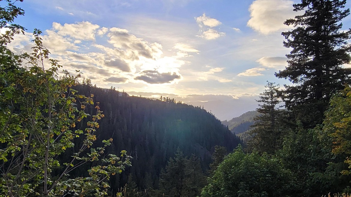 Sun passes behind some clouds on an afternoon drive along State Route 12 between Yakima and Packwood. There’s still time for a trip to the mountains before snow flies and driving becomes dangerous.