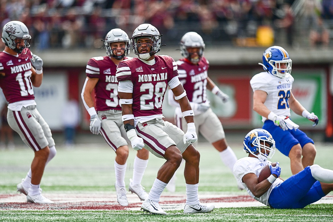 Grizzlies linebacker Isiah Childs (28) celebrates after a tackle on a kick return against Morehead State on Saturday, Sept. 14. (Casey Kreider/Daily Inter Lake)