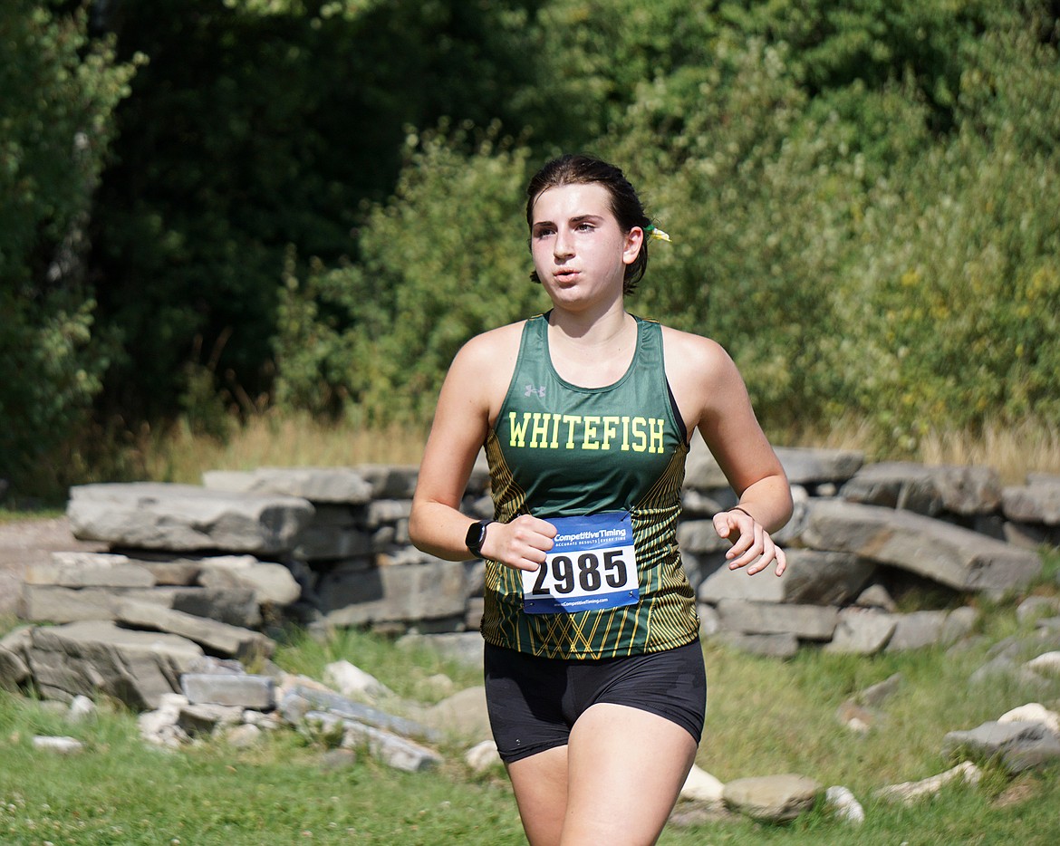 Senior Kellie Klepper pushes toward the finish at the Browning Invitational on Friday. (Matt Weller Photo)