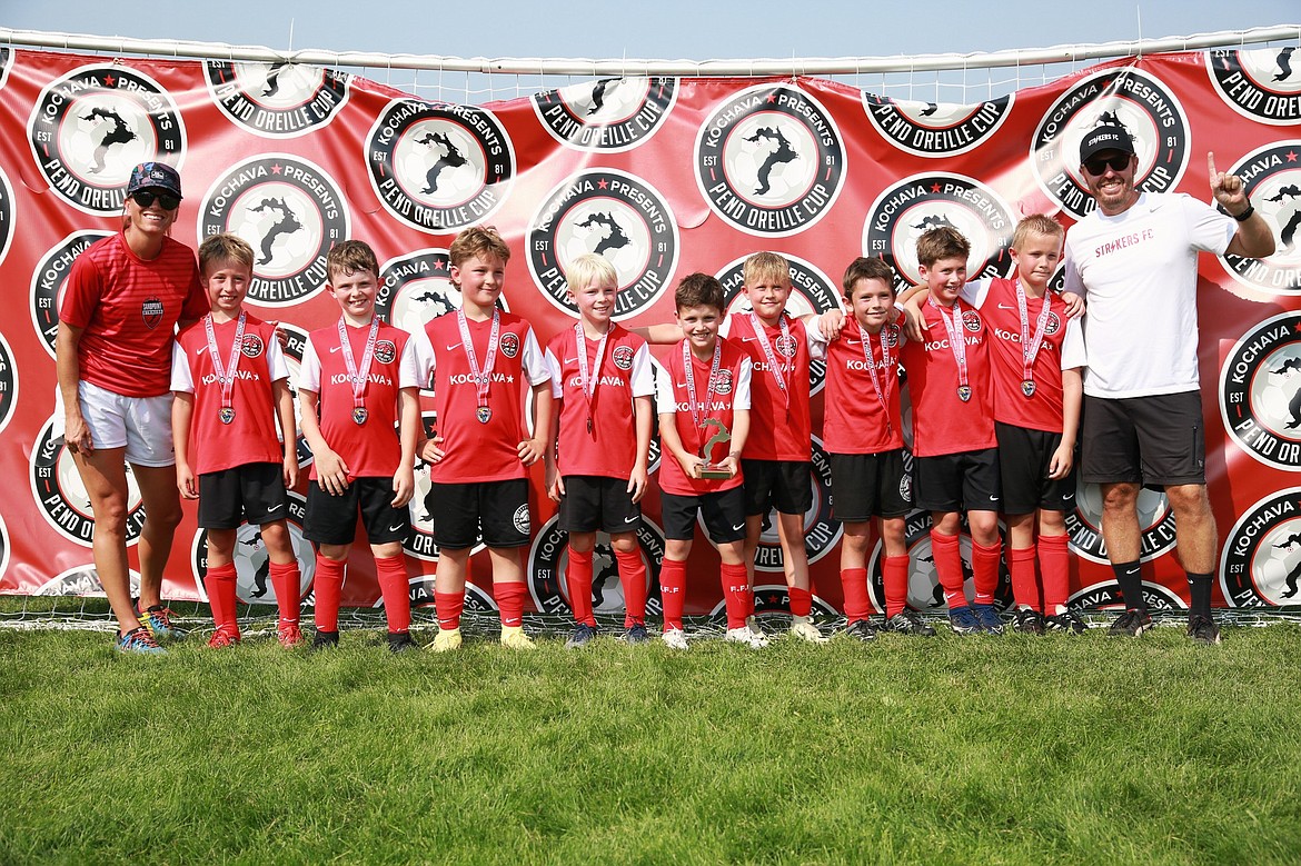 The 2015 Sandpoint Strikers (Black) boys' soccer team won the Nike Division of the Pend Oreille Cup. From left to right, coach Angie Kerr, Magnus Hall, Quinn Yost, Sebastian Steidl, Niko Lien, Theo Kerr, Jaikob Monk, Jace Tuttle, Avery Rust, Oliver Totland and coach Chad Hall.