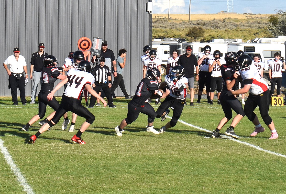 The ACH offense works to push forward during Saturday's match-up against the Garfield-Palouse Vikings.