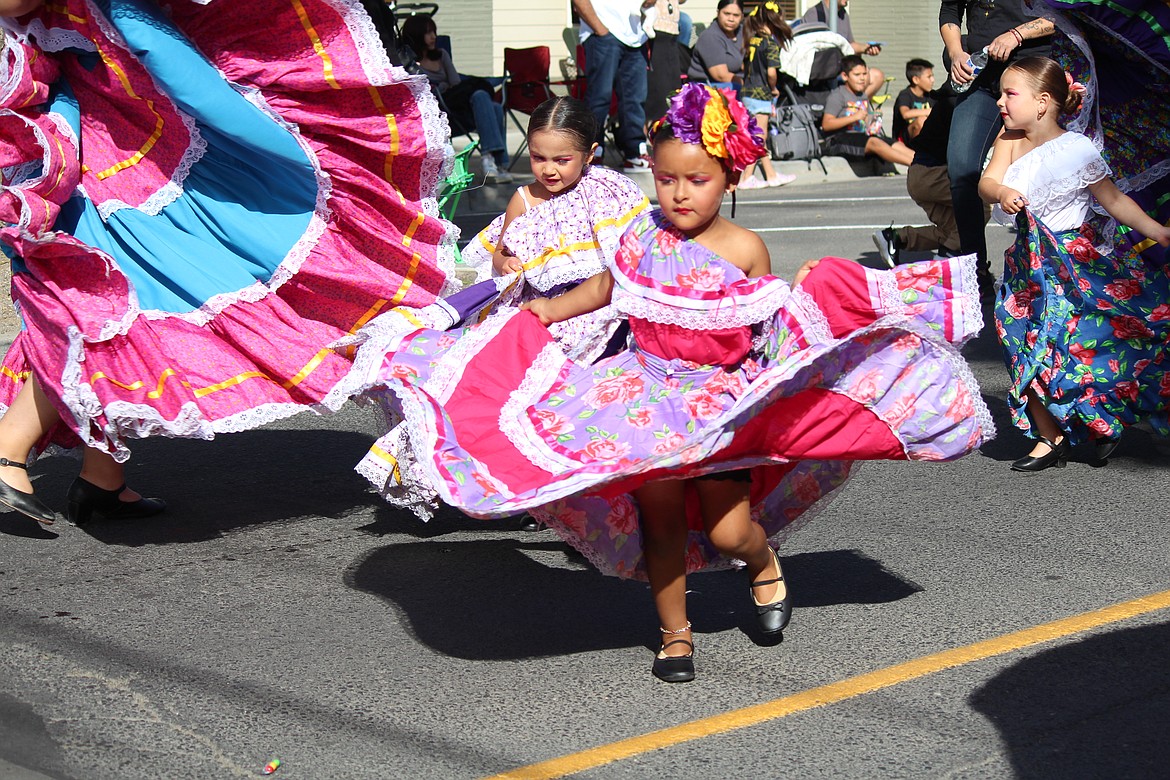 A dancer with Ballet Sol y Luna, Quincy shows off her moves in the FCAD parade.