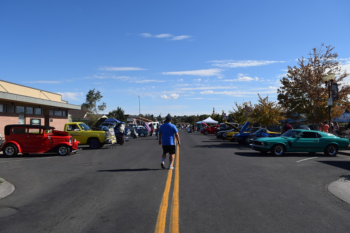 Moses Lake Classic Car Club showed off their vehicles at the entrance to the Sip and Stroll.