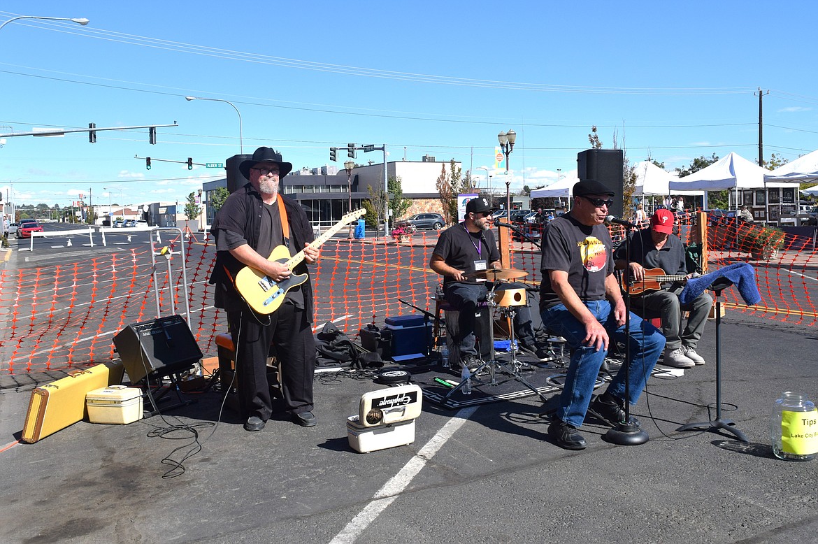 The Lake City Blues performed on Third street across from Art on Third for the Sip and Stroll event.