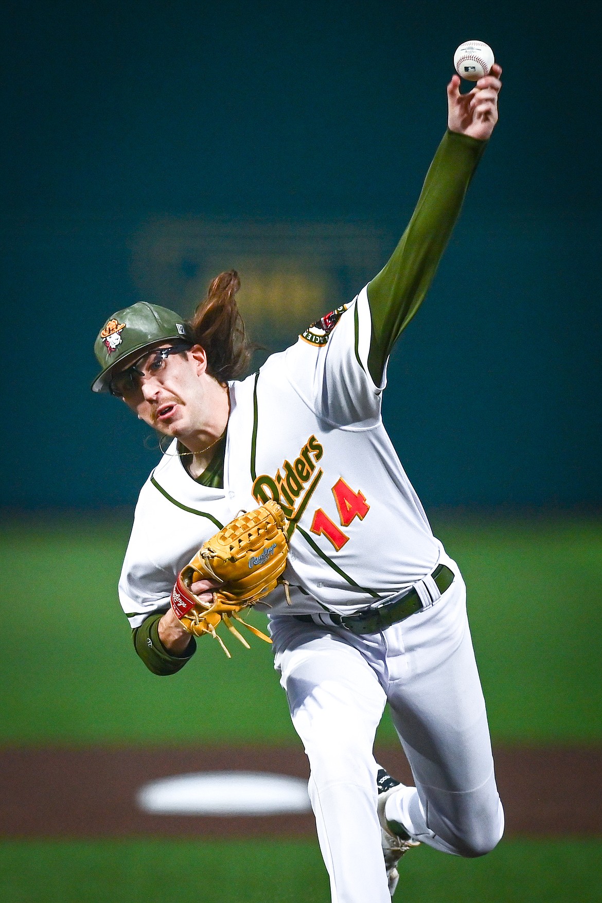 Glacier starting pitcher Kaleb Sophy (14) delivers in the first inning against Yolo during Game 1 of the Pioneer League Championship Series at Glacier Bank Park on Tuesday, Sept. 17. (Casey Kreider/Daily Inter Lake)