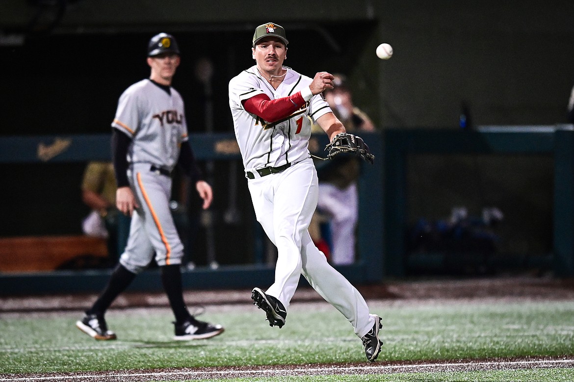 Glacier third baseman Christian Kirtley (1) throws to first after bare-handing a slow-roller against Yolo during Game 1 of the Pioneer League Championship Series at Glacier Bank Park on Tuesday, Sept. 17. (Casey Kreider/Daily Inter Lake)