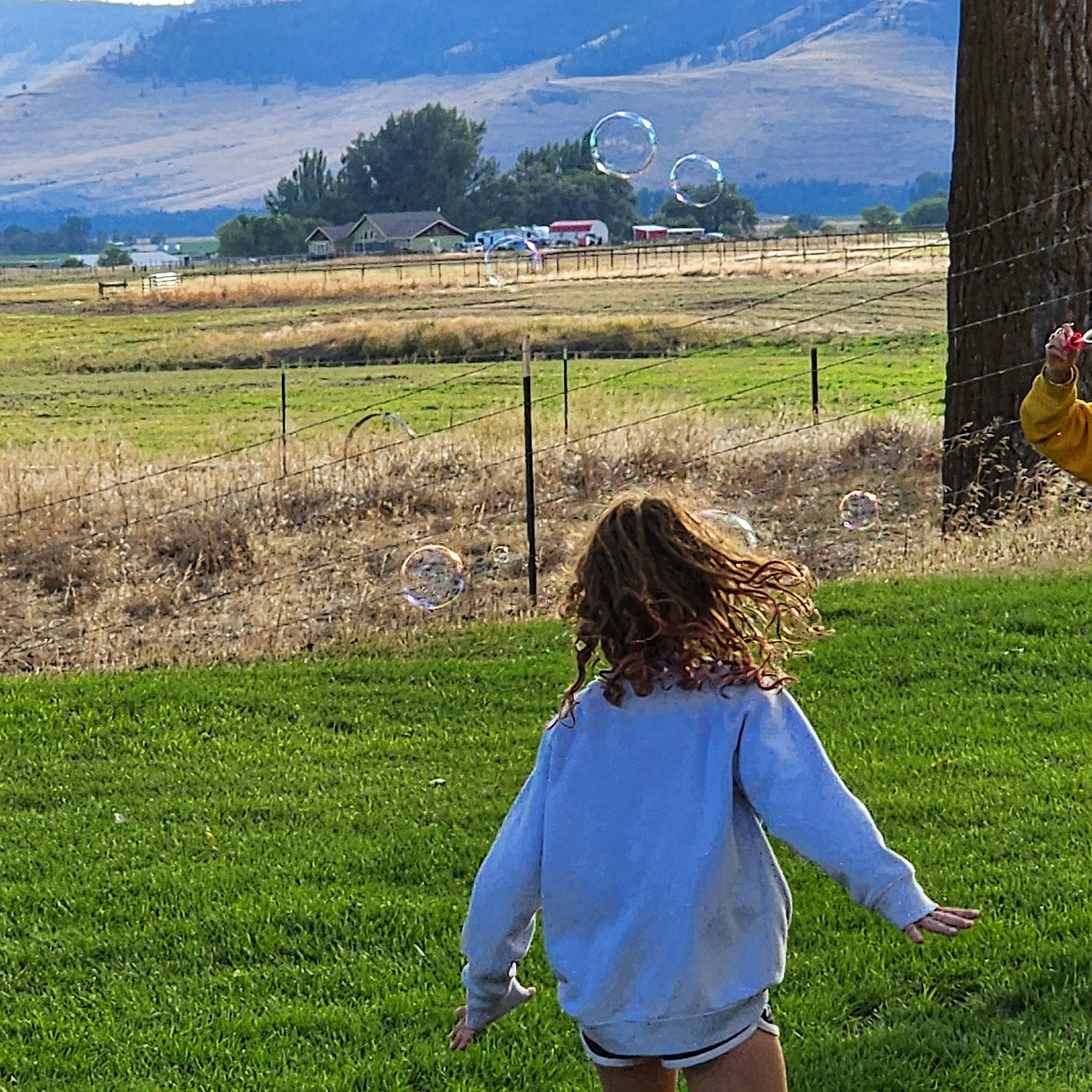 Bubbles and a sunny day make for a fun day in Valley View for youngsters. (Berl Tiskus/Leader)